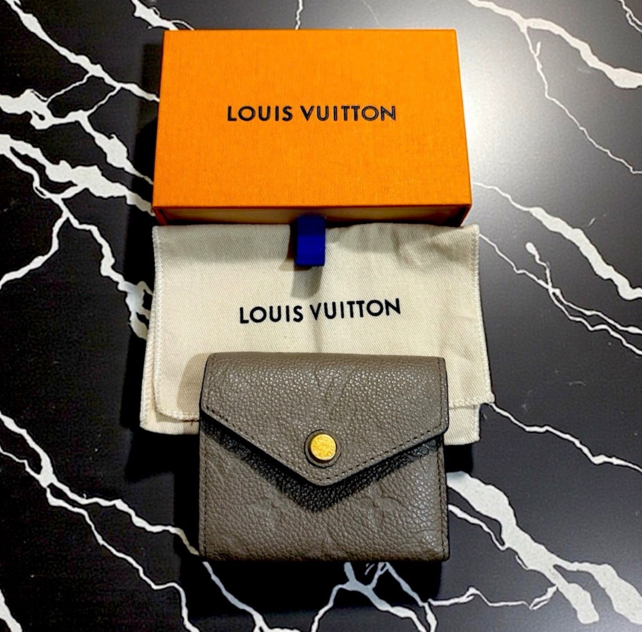 EUC Louis Vuitton Empreinte Zoe Compact wallet